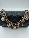 CHANEL Black Quilted Lambskin Mini Rectangular Coco Charms Flap Bag