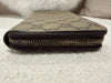 Gucci zipper wallet GG supreme canvas