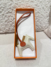 HERMES RODEO PM BAG CHARM CRAIE/SESAME/CORNLINE STAMP Y