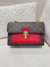 LOUIS VUITTON MONOGRAM CANVAS AND LEATHER CERISE VICTOIRE BAG