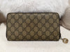Gucci zipper wallet GG supreme canvas