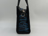 BALENCIAGA TAGS ITS BAZAR SHOPPER BAG WITH CUSTOM GRAFFITI