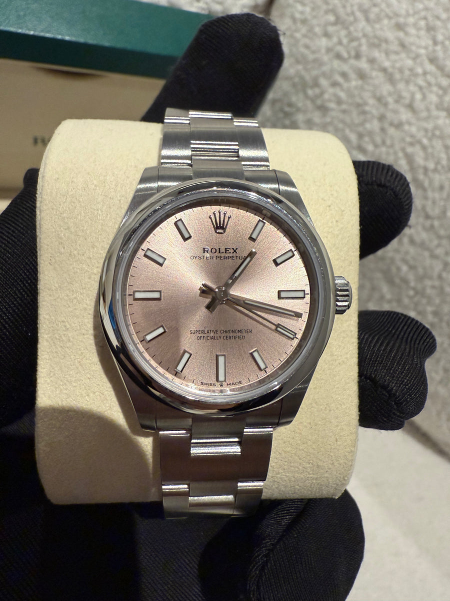 Rolex Oyster Perpetual 31 Stainless Steel Smooth Bezel Pink Index Dial